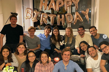 Ana and Nico along with colleagues and friends in their apartment in Boston on Ana's 26th birthday party